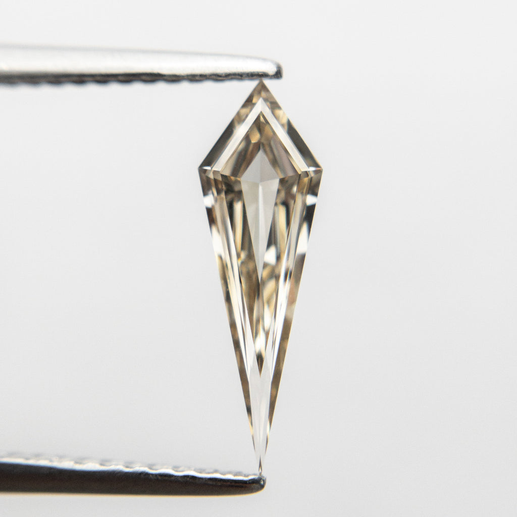 0.58ct 13.83x4.36x1.91mm VS+ Champagne Kite Step Cut 18518-01 - Misfit Diamonds