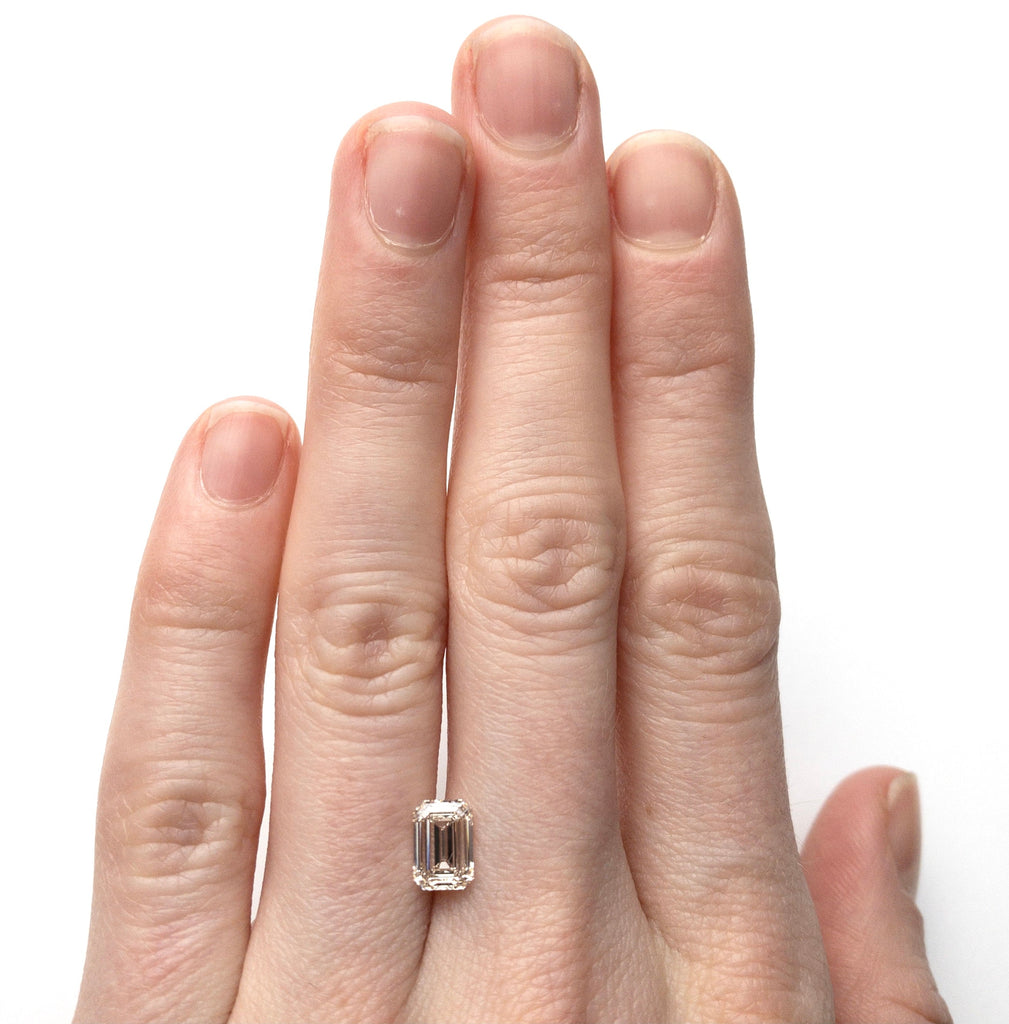 1.06ct 6.94x4.77x3.01mm VS2 Champagne Emerald Step Cut 18535-01 - Misfit Diamonds