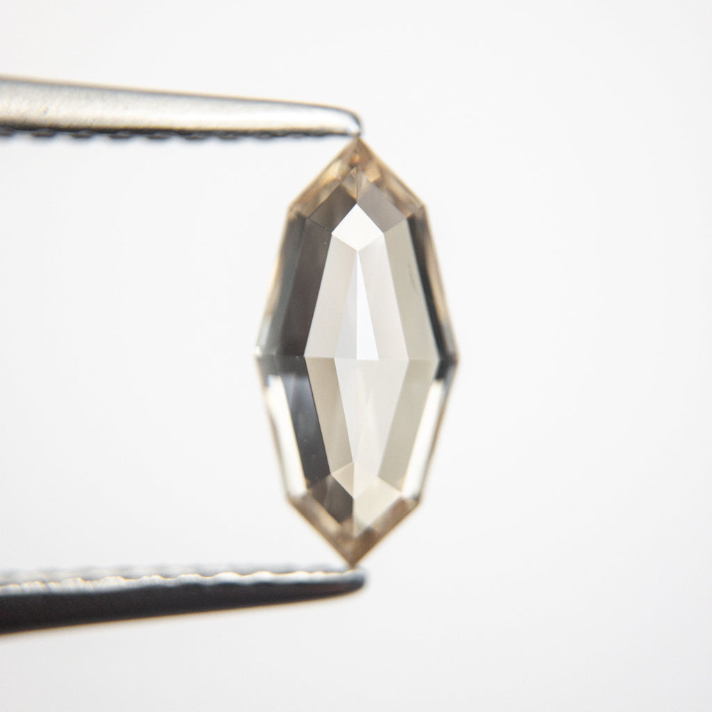 1.07ct 10.53x5.12x2.83mm SI1 Champagne Step Cut Marquise 18839-02 - Misfit Diamonds