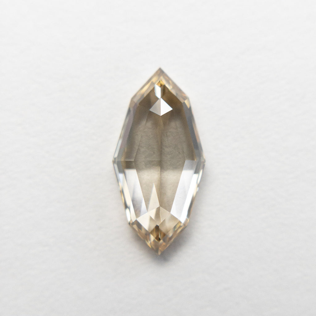 1.08ct 10.49x5.21x2.84mm SI1 Champagne Step Cut Marquise 18839-03 - Misfit Diamonds