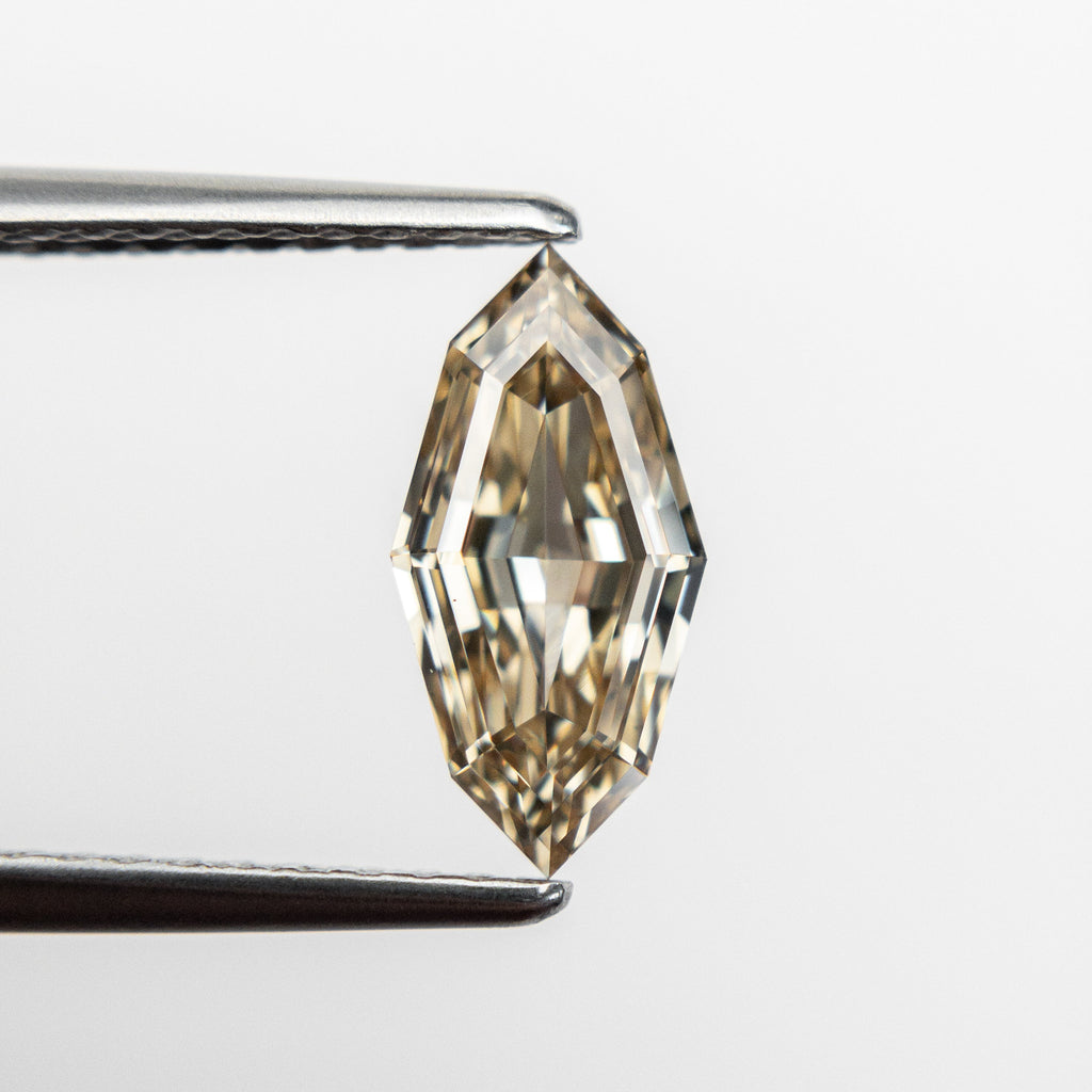 1.08ct 10.49x5.21x2.84mm SI1 Champagne Step Cut Marquise 18839-03 - Misfit Diamonds