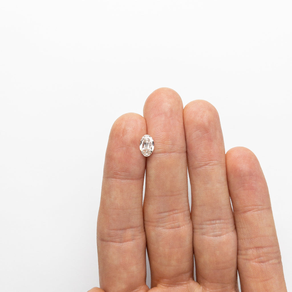 1.02ct 8.66x5.56x2.74mm SI2 K Oval Brilliant 19163-19 🇨🇦 - Misfit Diamonds